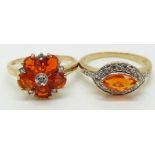 A 9ct gold ring set with pear cut Mexian fire opals and white sapphires and a 9ct gold ring set with