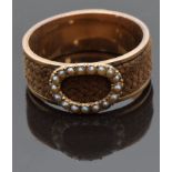 Victorian mourning ring set with plaited hair and an oval section set with seed pearls, size P/Q,