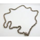 A large Victorian silver necklace made up of alternating textured and plain links, with unusual