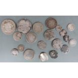 A collection of twenty silver coins Edward I, Charles I, Victoria, love tokens etc