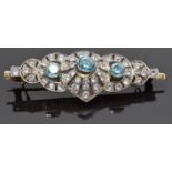 A 9ct gold brooch set with white and blue zircons, 6 x 2cm, 11.6g