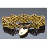 A 9ct gold gate bracelet made up of textured and plain links, 23.7g