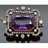 Victorian brooch set with an emerald cut amethyst surrounded by old cut diamonds, 3.4 x 2.8cm