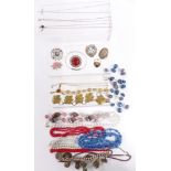 A collection of jewellery including Charles Horner silver bangle, Miracle brooch etc