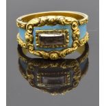 Victorian mourning ring set with plaited hair to the central glass compartment, with turquoise