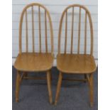Two Ercol style light elm dining chairs