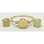 A 9ct gold ring set with a round Ethiopian opal cabochon and two diamonds with similar earrings, 2.