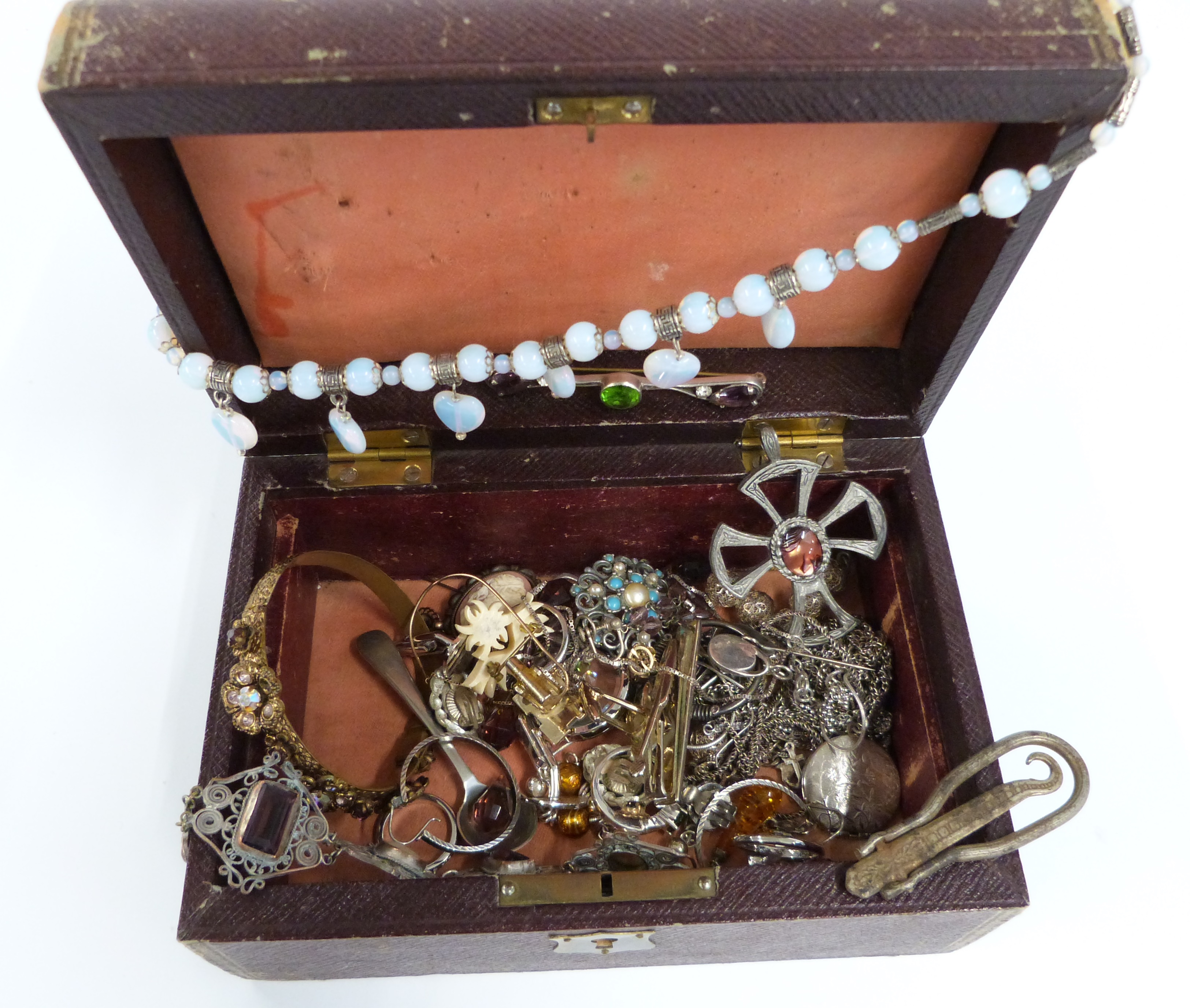 A collection of costume jewellery including silver necklaces, silver ring, filigree cross pendant,