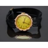 A 9ct gold ladies wristwatch with Arabic numerals, blued Breguet hands and daisy shaped case, on
