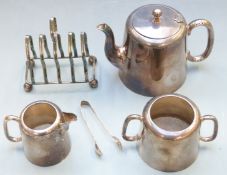 Silver plated tea service comprising teapot, milk jug, sugar, sugar nips and a toast rack