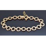 A 9ct gold bracelet made up of circular links, maker ACC, 19cm, 11.4g