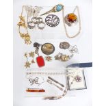 A collection of silver jewellery including ring, Scottish silver brooch by WBS, silver necklaces,