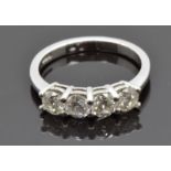 An 18ct white gold ring set with four diamonds each approximately 0.25cts, total carat weight