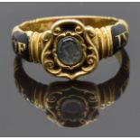 Victorian 18ct gold mourning ring set with a central glass compartment, with in a black enamel