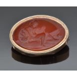 Victorian rose gold brooch set with a carnelian agate panel/ intaglio carved to depict a Roman