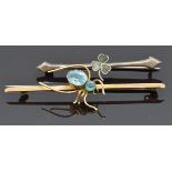 A 9ct gold brooch set blue topaz in the form of a spider (3.6g) and a silver brooch set with agate