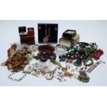 A collection of costume jewellery including beads, etc