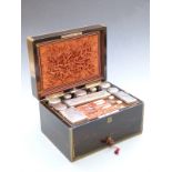 19thC coromandel wood brass bound ladies travelling box, the hinged lid opening to reveal fitted
