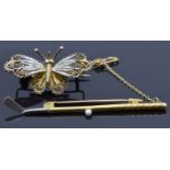 A 15ct gold bar brooch in the form of a golf club (3.4g) and a filigree butterfly brooch