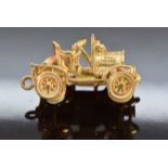 A 9ct gold pendant/charm in the form of a vintage car, 9g