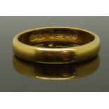 A 22ct gold wedding band/ ring, size L, 3.88g