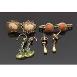 A pair of 9ct gold cameo earrings, 9ct gold earrings and a brooch set with coral