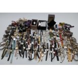 A large collection of various ladies and gentleman's wristwatches, some in original boxes.