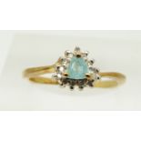 A 9ct gold ring set with a trilliant cut topaz and diamonds, 1.7g, size M