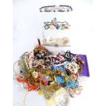 A collection of costume jewellery including silver locket, silver bracelet, beads, Sarah Coventry