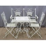 White painted wire work garden table, bench and two chairs, length of bench 114cm