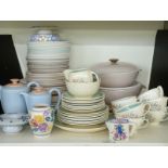 A collection of Poole pottery and Susie Cooper dinner, tea and decorative ware including an early