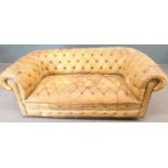 Brown leather Chesterfield two seat sofa, length 180cm
