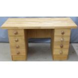 Modern oak desk with four drawers to each side, W136 x D60 x H76cm