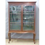 19thC glazed two door display cabinet with adjustable shelves, raised on cabriole legs, W127 x D37 x
