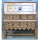 Oak Arts and Crafts style bureau with inlaid decoration, W95 x D51 x H107cm