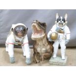 Two novelty space travelling animal models and a dinosaur, height of tallest 37cm