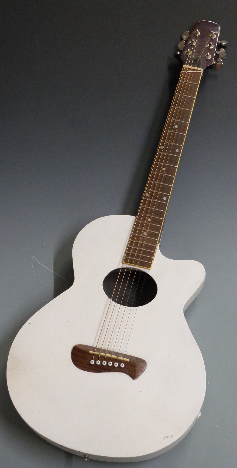 Adam Black semi acoustic guitar, reg no 025622, fitted with six steel strings, in white finish