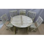 Teak extending garden table and six chairs (four being folding examples), minimum length of table