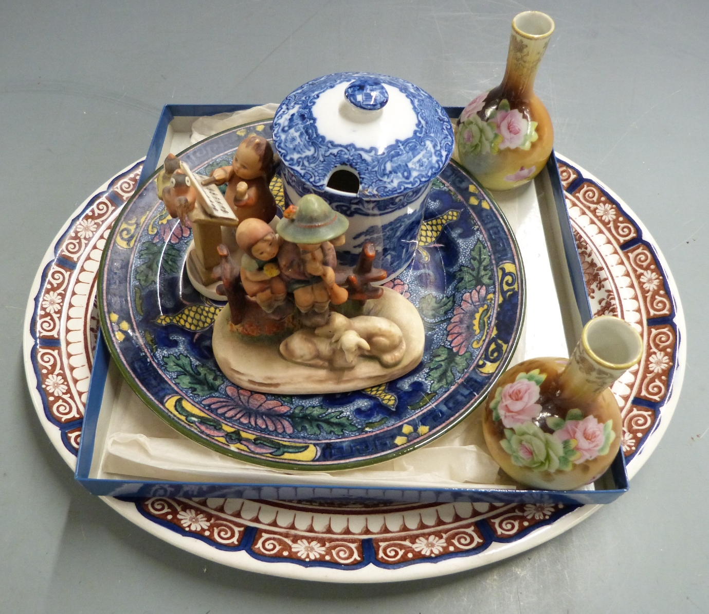 Wedgwood meat plate, Royal Doulton 'Persian' plate, Goebel Hummel figures, George Jones Abbey