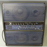 Roland Boss digital multi echo RE-1000 amplifier with speaker system.
