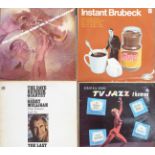 Approximately thirty albums mostly Jazz including Dave Brubeck, Stanley Clarke, Charlie Parker etc