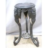 Indian or similar table or jardiniere stand, the legs formed as elephant heads and trunks, height