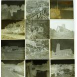 Approximately twenty late 19th/ early 20thC glass photographic negatives including ships in harbour,