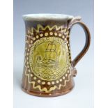Peter Brown Snake Pottery of Cam, Dursley, Gloucestershire mug commemorating the Stroudwater