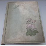 Circa WWI/ early 20thC postcard album containing largely German glamour and greetings postcards,