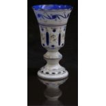 Bohemian overlaid glass vase with hand painted floral decoration, gilt banding and white casing over