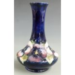 Moorcroft pedestal vase decorated in the pansy pattern, signed and impressed Moorcroft and 'by