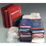 A large quantity of GB presentation packs, first day covers and PHQ cards, loose and in albums and