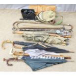 Quantity of sporting equipment and walking sticks including hallmarked silver mounted examples
