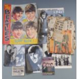 Mainly Beatles bubble gum cards, scrapbook, sheet music, scrap book and newspaper cuttings etc